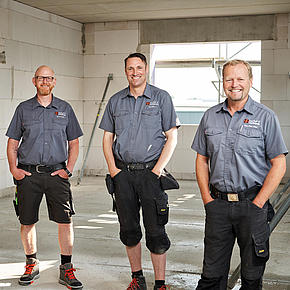 Vier Teammitglieder des Bauunternehmens Höft Bau aus Flensburg